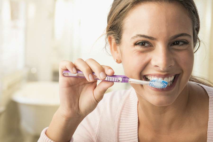 dental patient brushing teeth
